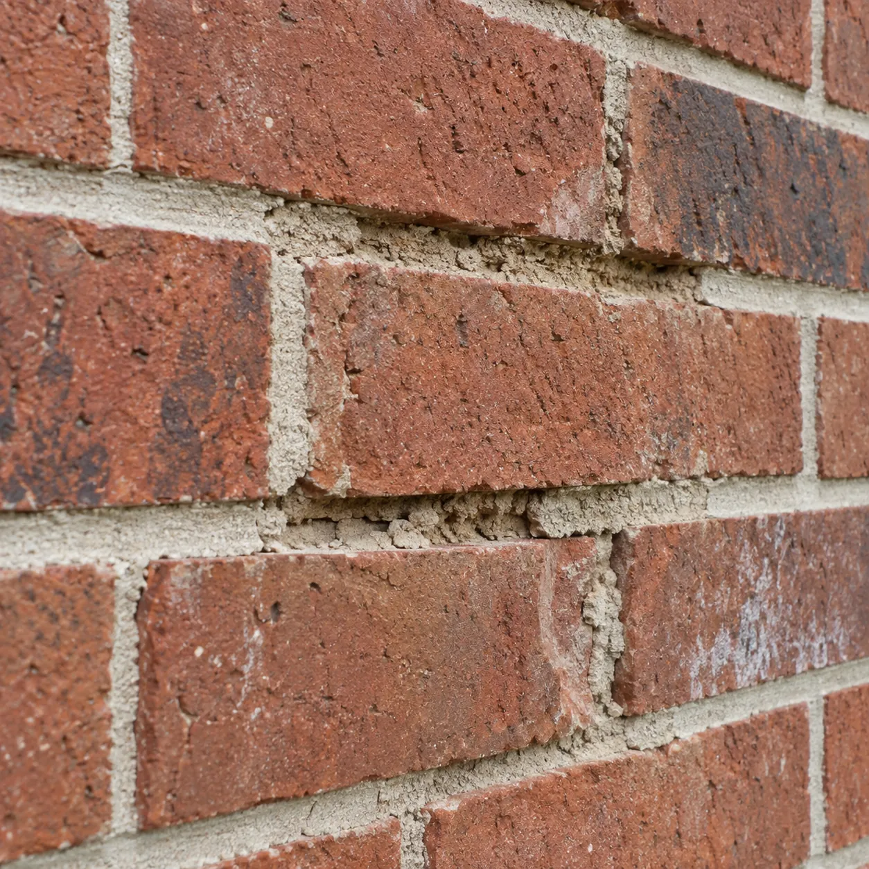 Realistic educational example of crumbling mortar joints